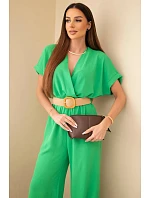 Kombinéza s ozdobným páskem v pase zelený