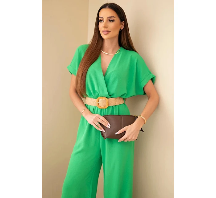 Kombinéza s ozdobným páskem v pase zelený