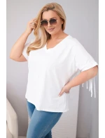 Dámská bavlněná halenka s výstřihem do V a třásněmi na zádech bílá