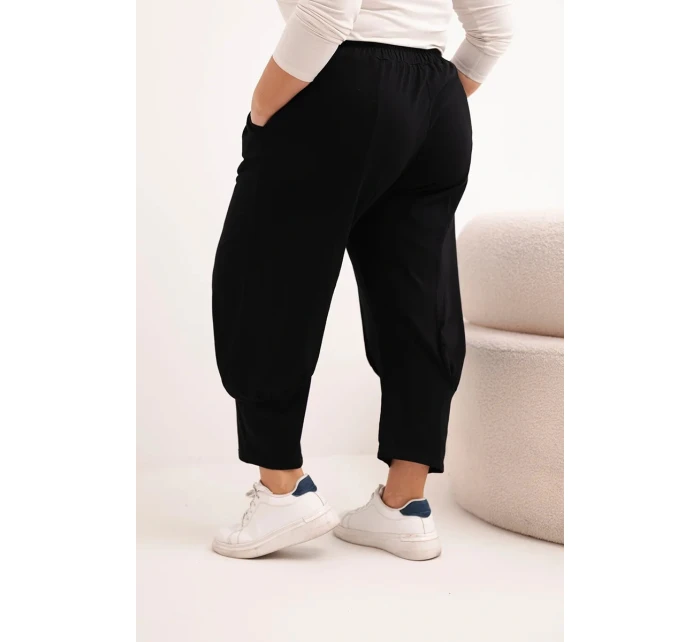Dámské kalhoty Plus Size s nízkým sedem a gumou v pase černé