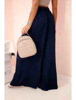 Široké dámské viskózové kalhoty s elastickým pasem tmavě modré Široké dámské viskózové kalhoty s elastickým pasem tmavě modré