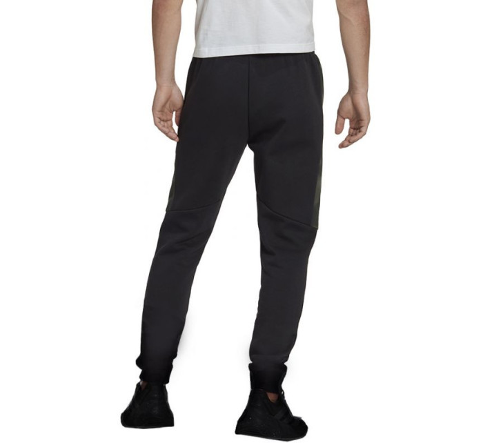 Fleecové kalhoty adidas Essentials Camo Print M HL6929