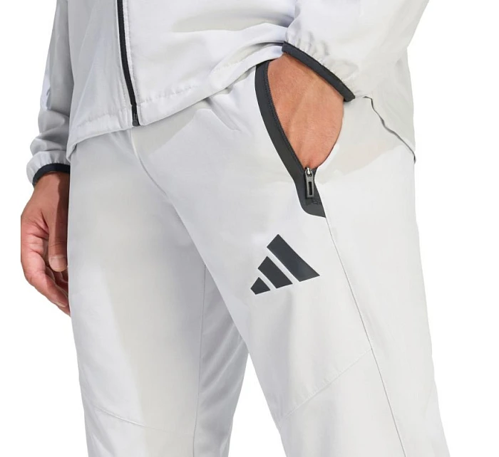 Pánské kalhoty adidas Tiro 26 Travel Woven světle šedé KE8363