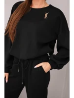 Dámský komplet máslová mikina s broží a kalhoty s rovnými nohavicemi černý