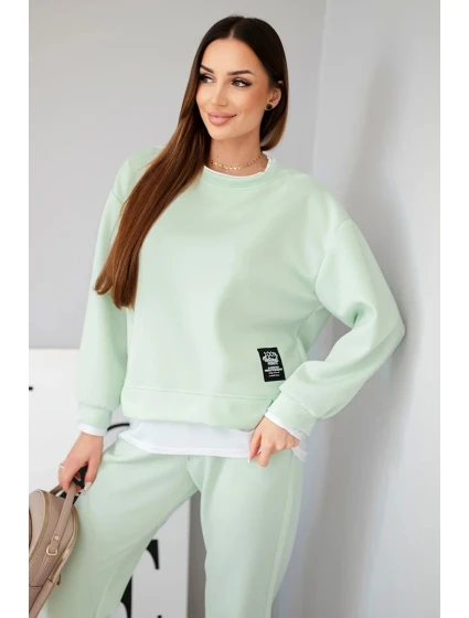 Dámský komplet s volnou mikinou a tepláky jasně mátová model 21808631 - K-Fashion Dámský komplet s volnou mikinou a tepláky jasně mátová model 21808631 - K-Fashion