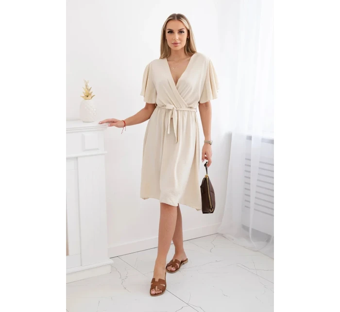 Šaty s vrstveným výstřihem béžový