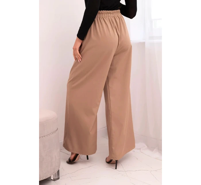 Dámské elegantní kalhoty s širokou nohavicí a ozdobným květem fango Dámské elegantní kalhoty s širokou nohavicí a ozdobným květem fango