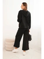 Dámská souprava model 21407227 s širokými nohavicemi a mikinou na zip černý - K-Fashion Dámská souprava model 21407227 s širokými nohavicemi a mikinou na zip černý - K-Fashion