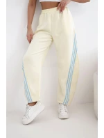 Dámské máslové kalhoty z viskózy s lampasem žluté