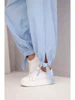 Dámské kalhoty s širokým nohavicím a zavazováním dole modré Dámské kalhoty s širokým nohavicím a zavazováním dole modré