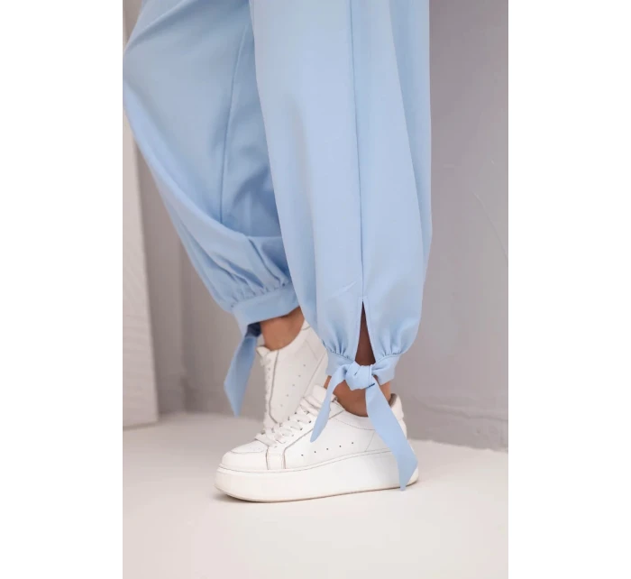 Dámské kalhoty s širokým nohavicím a zavazováním dole modré Dámské kalhoty s širokým nohavicím a zavazováním dole modré