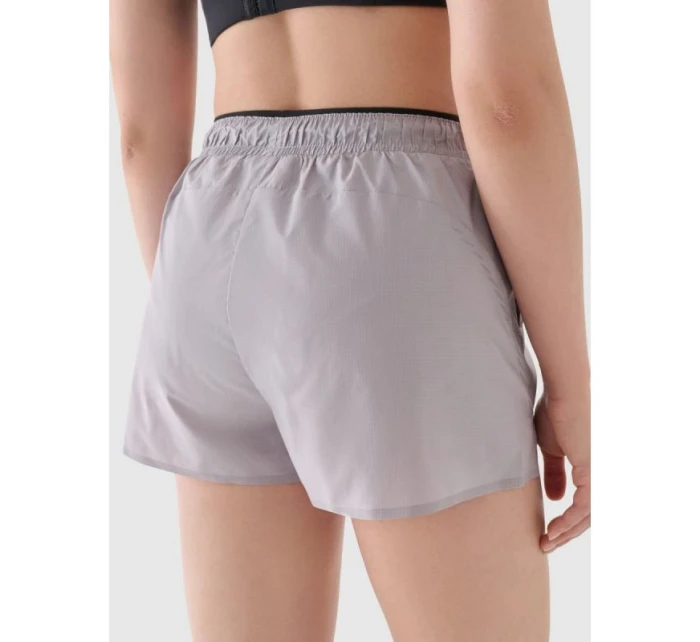 Dámské rychleschnoucí běžecké šortky model 21907330 dámské - 4F Dámské rychleschnoucí běžecké šortky model 21907330 dámské - 4F