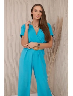 Kombinéza s ozdobným páskem v pase tyrkys