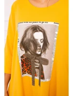 Šaty s potiskem a rozšířeným spodním dílem v hořčicové barvě Šaty s potiskem a rozšířeným spodním dílem v hořčicové barvě