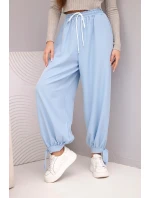 Dámské kalhoty s širokým nohavicím a zavazováním dole modré Dámské kalhoty s širokým nohavicím a zavazováním dole modré