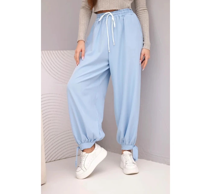 Dámské kalhoty s širokým nohavicím a zavazováním dole modré Dámské kalhoty s širokým nohavicím a zavazováním dole modré
