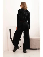 Dámský velurový komplet tepláků se širokými nohavicemi a mikinou s kapucí černý Dámský velurový komplet tepláků se širokými nohavicemi a mikinou s kapucí černý