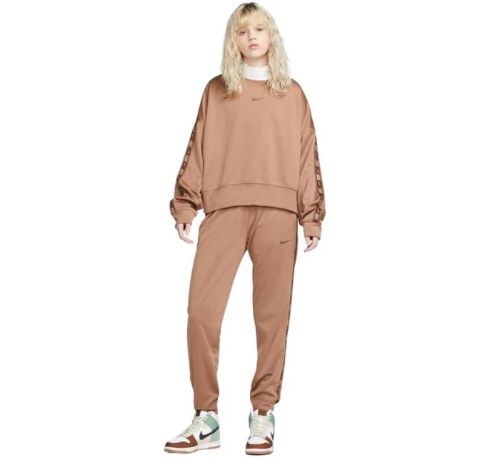 Dámské tepláky Nsw PK Tape Reg W DM4645 256 - Nike