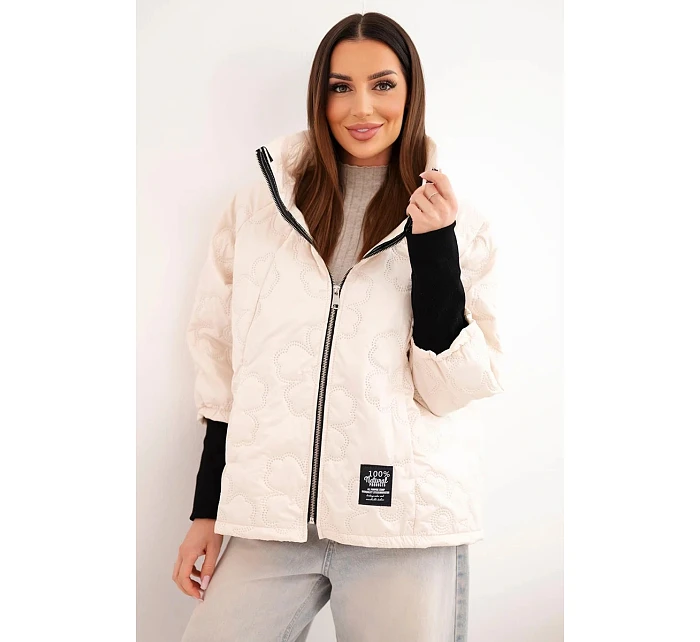 Dámská jarní prošívaná bunda s ozdobnou model 22040178 a zipem světle béžová - K-Fashion