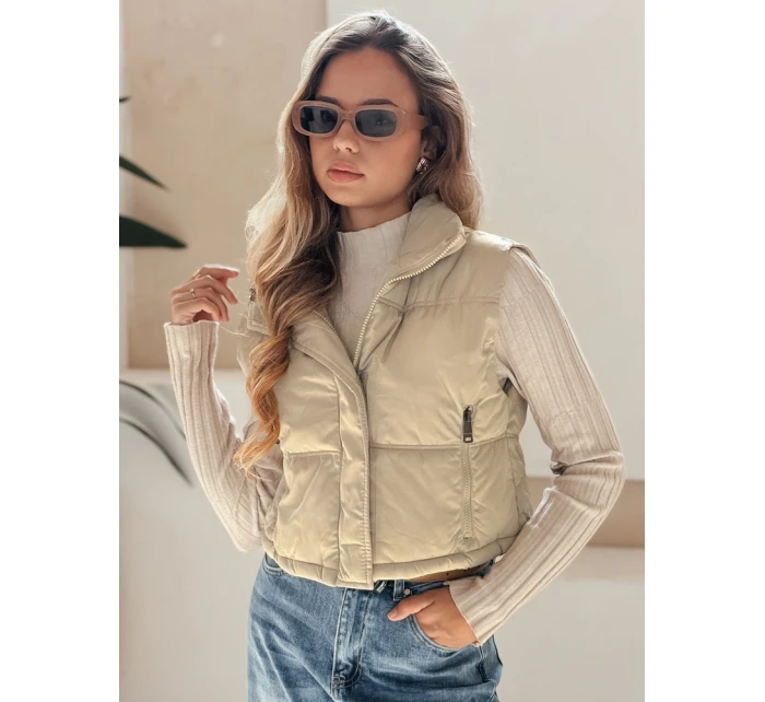 Dámská prošívaná béžová vesta Dstreet model 21991827 - FashionStreet Dámská prošívaná béžová vesta Dstreet model 21991827 - FashionStreet