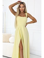 dlouhé šaty s rozparkem a výstřihem typu  žluté s třpytkami model 22092786 - numoco