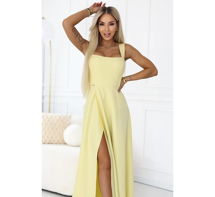 dlouhé šaty s rozparkem a výstřihem typu  žluté s třpytkami model 22092786 - numoco