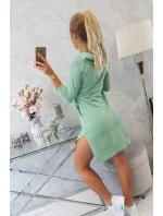 Šaty s delšími zády a barevným potiskem tmavě mátové barvy Šaty s delšími zády a barevným potiskem tmavě mátové barvy