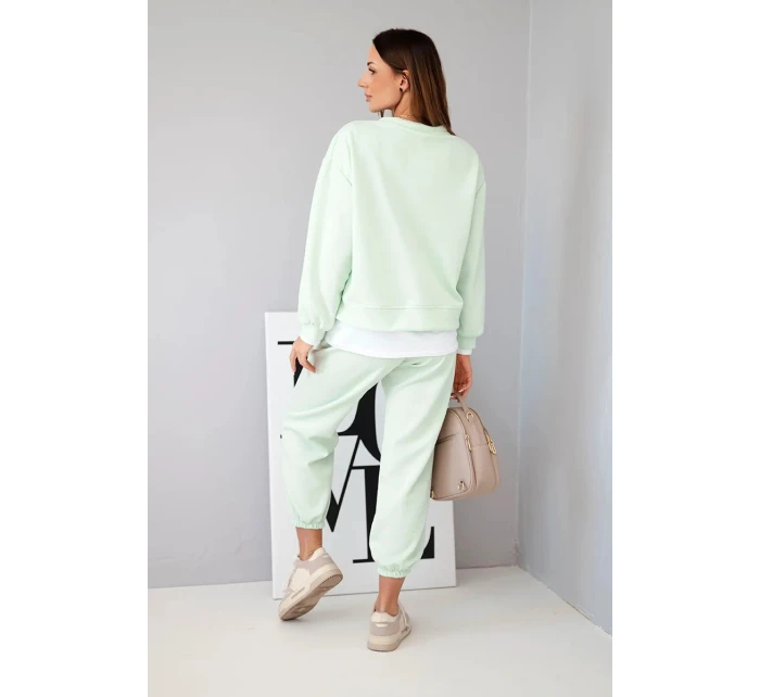 Dámský komplet s máslovou barvou, volnou mikinou a tepláky jasně mátová Dámský komplet s máslovou barvou, volnou mikinou a tepláky jasně mátová