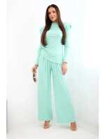 Dámská bavlněná souprava s halenkou a kalhotami s širokými nohavicemi mátová Dámská bavlněná souprava s halenkou a kalhotami s širokými nohavicemi mátová