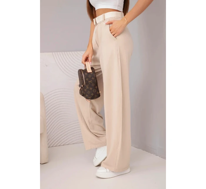 Dámské bavlněné kalhoty se širokou nohavicí a páskem béžové Dámské bavlněné kalhoty se širokou nohavicí a páskem béžové