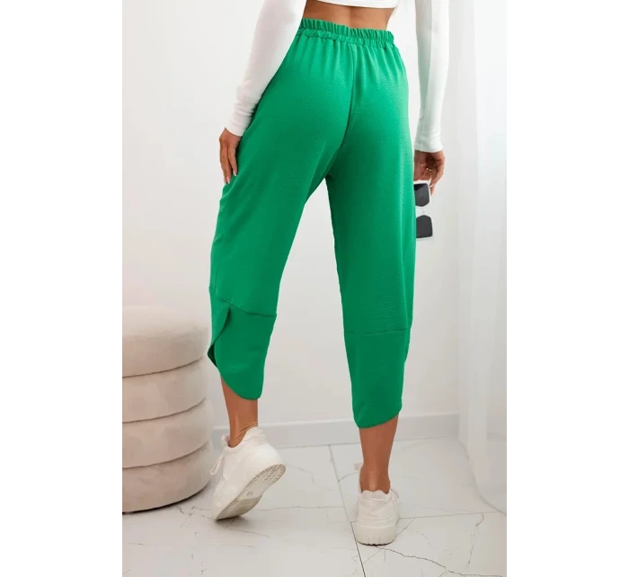 Kalhoty se širokými nohavicemi a kapsami zelený Kalhoty se širokými nohavicemi a kapsami zelený