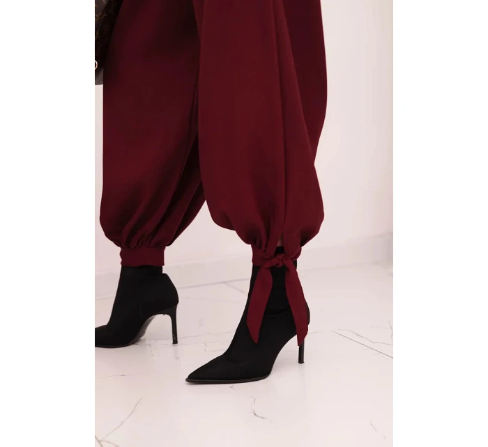 Dámské kalhoty s širokým nohavicí a zavazováním dole bordové