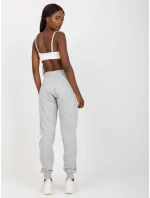 B 005 tepláky.04X šedá