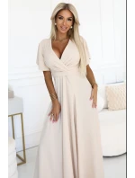 dlouhé šaty s rozparkem na rukávy a výstřihem BEACH model 21257172 - numoco dlouhé šaty s rozparkem na rukávy a výstřihem BEACH model 21257172 - numoco