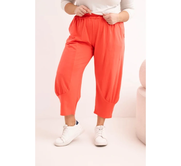 Dámské kalhoty Plus Size s nízkým sedem a gumou v pase korálové