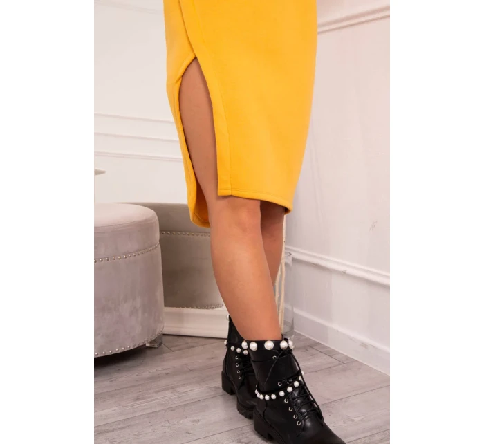 Šaty s kapucí a bočním rozparkem broskvové Šaty s kapucí a bočním rozparkem broskvové