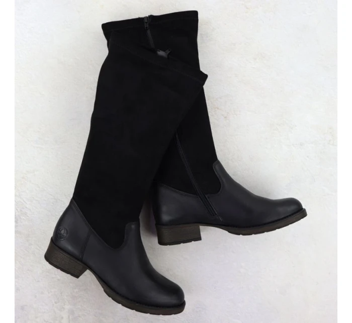 Dámské kožené boty na klínku zateplené černé Rieker 9551