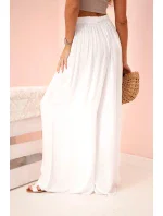 Široké dámské viskózové kalhoty s elastickým pasem bílé Široké dámské viskózové kalhoty s elastickým pasem bílé