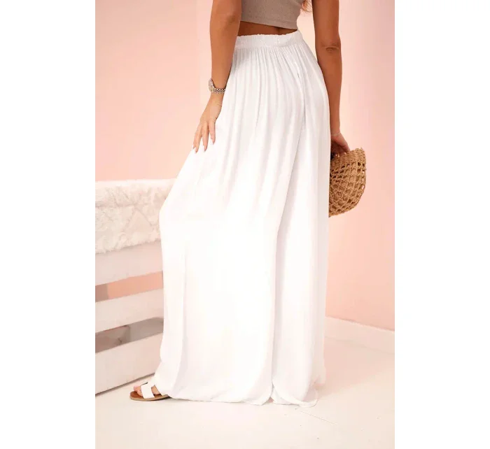 Široké dámské viskózové kalhoty s elastickým pasem bílé Široké dámské viskózové kalhoty s elastickým pasem bílé