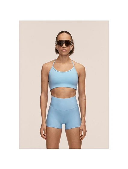 Sportovní podprsenka CASALL Sleek Strappy Sports Bra, modrá barva Sportovní podprsenka CASALL Sleek Strappy Sports Bra, modrá barva