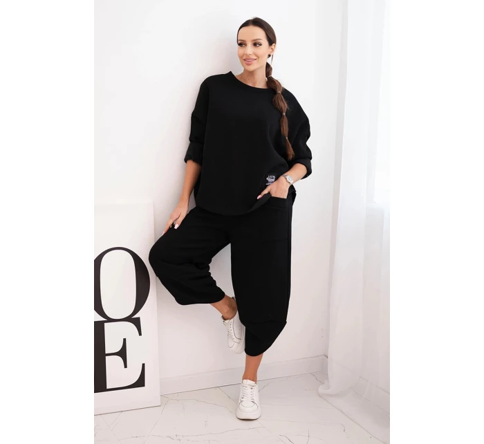 Dámský teplákový komplet z silnějšího materiálu se širokými nohavicemi černý Dámský teplákový komplet z silnějšího materiálu se širokými nohavicemi černý