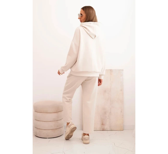 Komplet dámský máslový mikina s kapucí a kalhoty s páskem béžový Komplet dámský máslový mikina s kapucí a kalhoty s páskem béžový