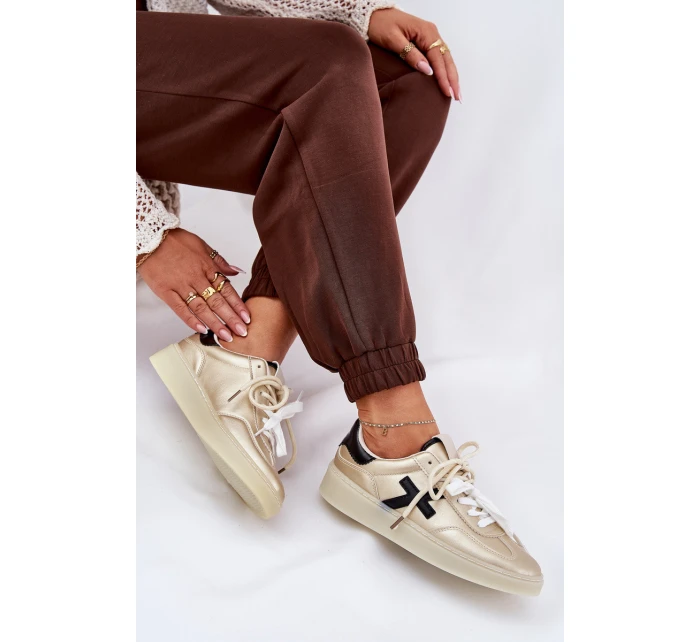 Nízké dámské sportovní boty zlaté model 21685903 - Boto Nízké dámské sportovní boty zlaté model 21685903 - Boto