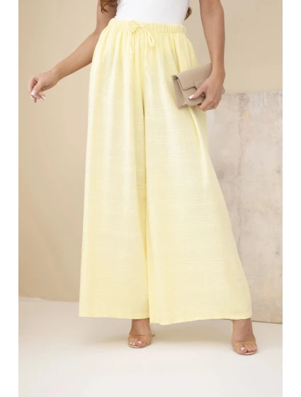 Dámské široké bavlněné kalhoty s gumičkou v pase žluté