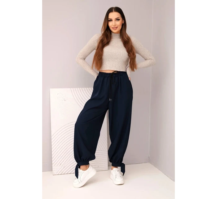 Dámské kalhoty s širokým nohavicí a vázáním dole modré