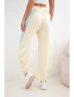 Dámské máslové kalhoty z viskózy s lampasem žluté