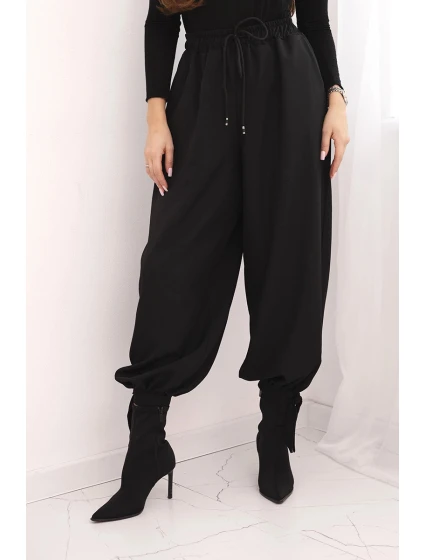 Dámské kalhoty s širokou nohavicí a zavazováním dole černé Dámské kalhoty s širokou nohavicí a zavazováním dole černé