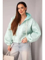 Dámská bunda prošívaná s kapucí a ozdobným květinovým vzorem mátová