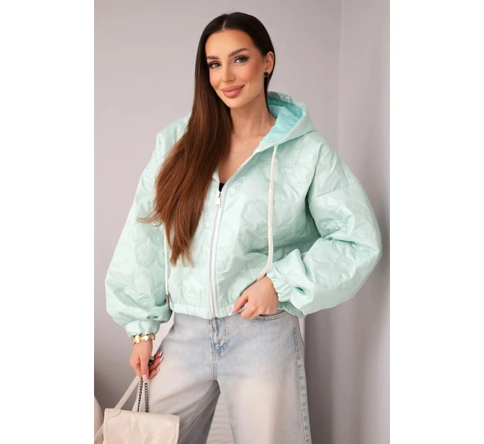 Dámská bunda prošívaná s kapucí a ozdobným květinovým vzorem mátová