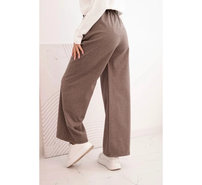 Dámské kalhoty s širokou nohavicí a páskem fango